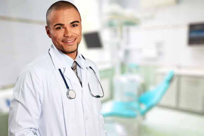 Dentist Standing in the Clinic