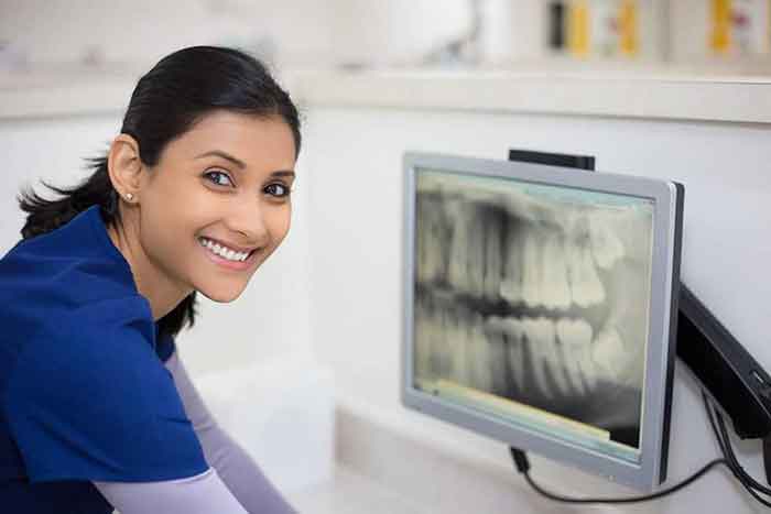 Girl Working On x-ray machine