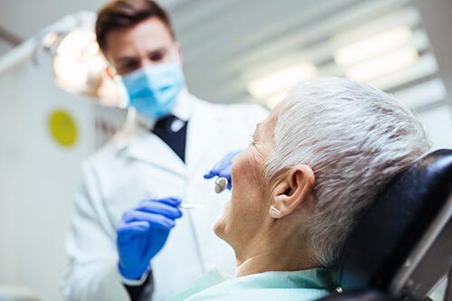 Dentist removing tooth