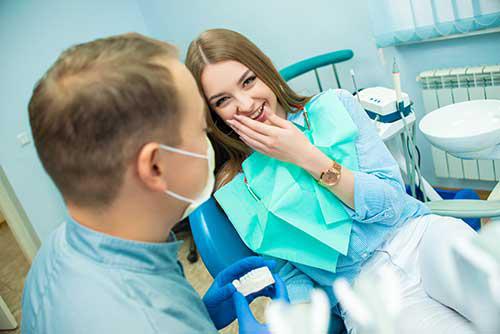 Dentist removing tooth