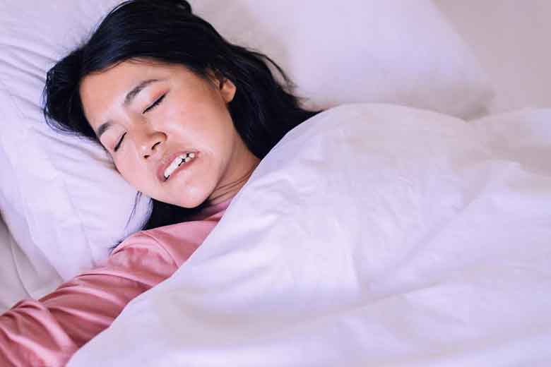 Girl sleeping on the bed