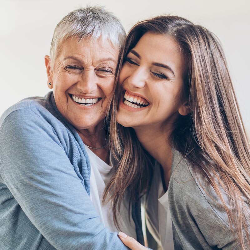 mother and daughter hugging