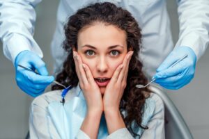 Patient in chair for dental numbing in Parker, CO